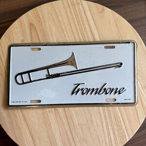 1989 A.I.M. PGH Trombone License Plate By Albert Elovitz White Black Gold
